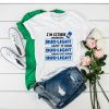 IM EITHER DRINKING BUD LIGHT ABOUT TO DRINK T-SHIRT DR23